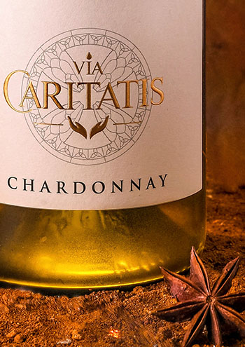 Bouteille vin blanc Via Caritatis anis étoilée
